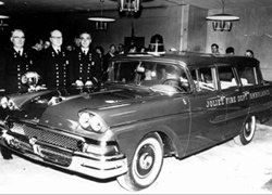 Historical photo of early fire department car