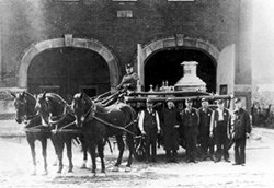 Historical photo of fire wagon with horses